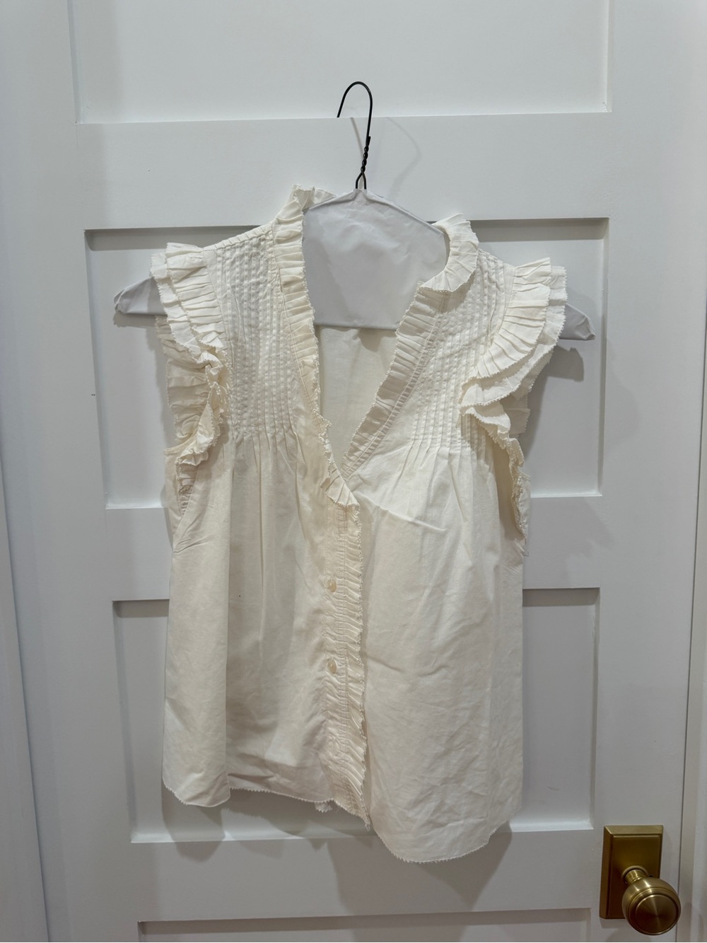 Sleeveless Ruffle-Trim Button Front Blouse in Cream